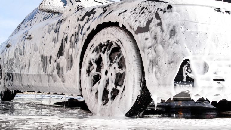 Car covered in car wash soap
